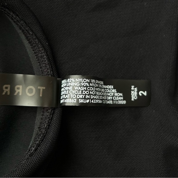 Torrid Asymmetrical Twist Front One-Piece Swim
Dress Black Plus Size 2X - Picture 16 of 16